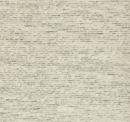 Beige textured rug close-up with soft woven stripes in cream and gray tones.