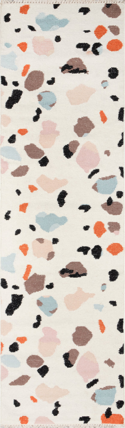 Terrazzo print rug runner in ivory with pastel blue, pink, peach, orange, brown and black chips.