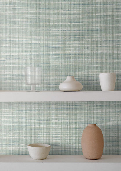 Japandi-style rustic green matte stringcloth textile on display.