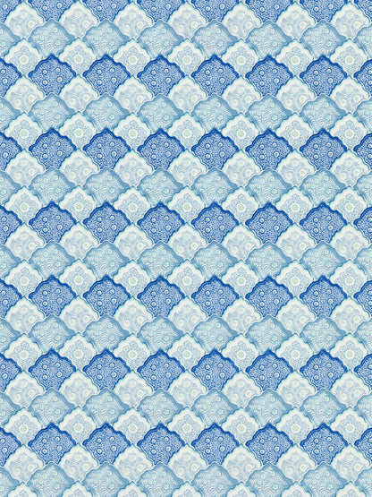 Blue and white tiled pattern with interlocking diamond motifs and intricate floral medallions in varying blue shades.
