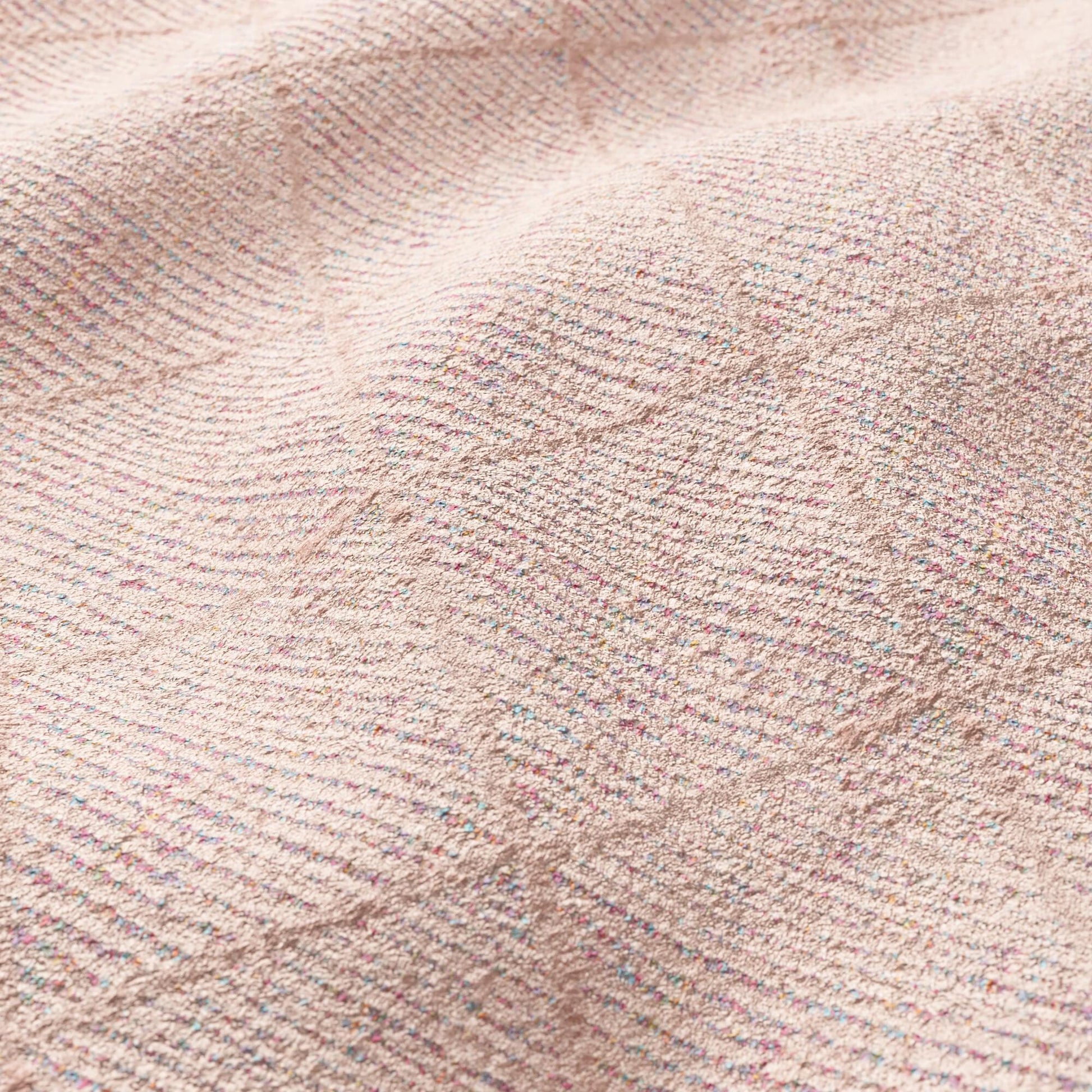 Pink blush velvet fabric with a diamond pattern.