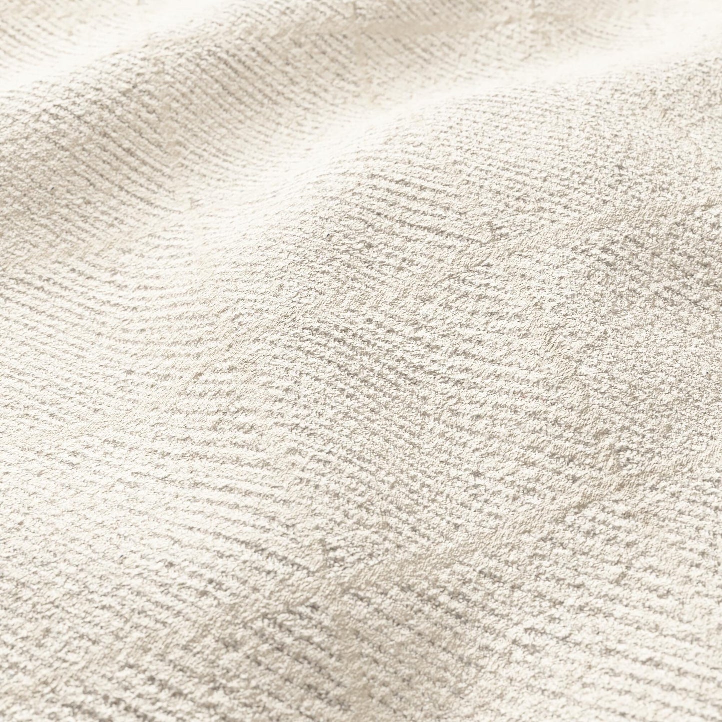 Beige velvet fabric close-up with plush pile and a subtle diamond pattern.