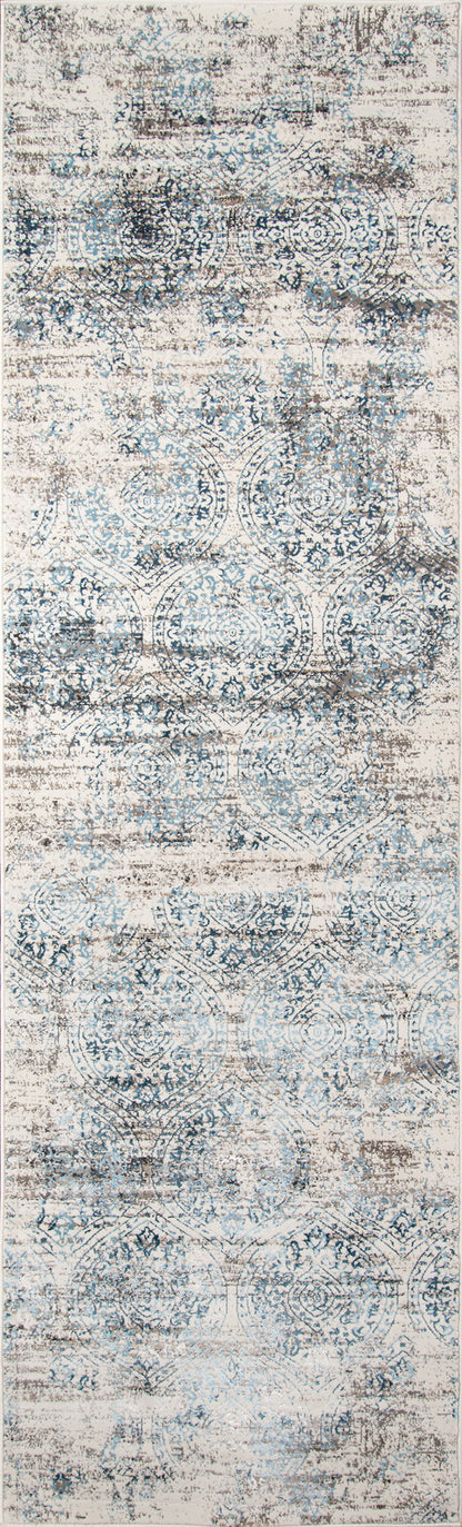 2' x 3' distressed blue and ivory area rug with faded medallion motifs; vintage-inspired, soft-textured look.