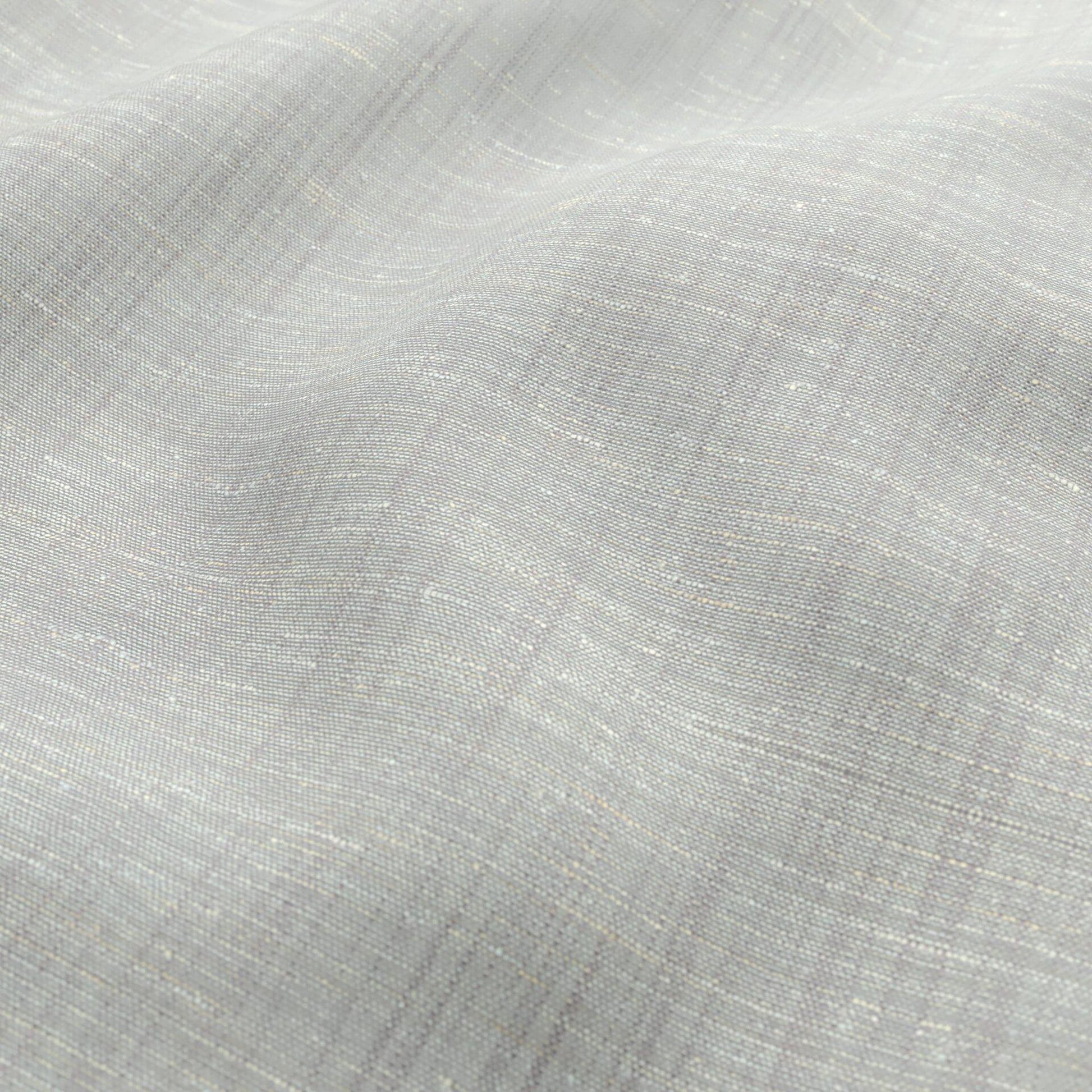Cream-colored, linen-look fabric with subtle white flecks and a soft, drapey, sheer woven texture.