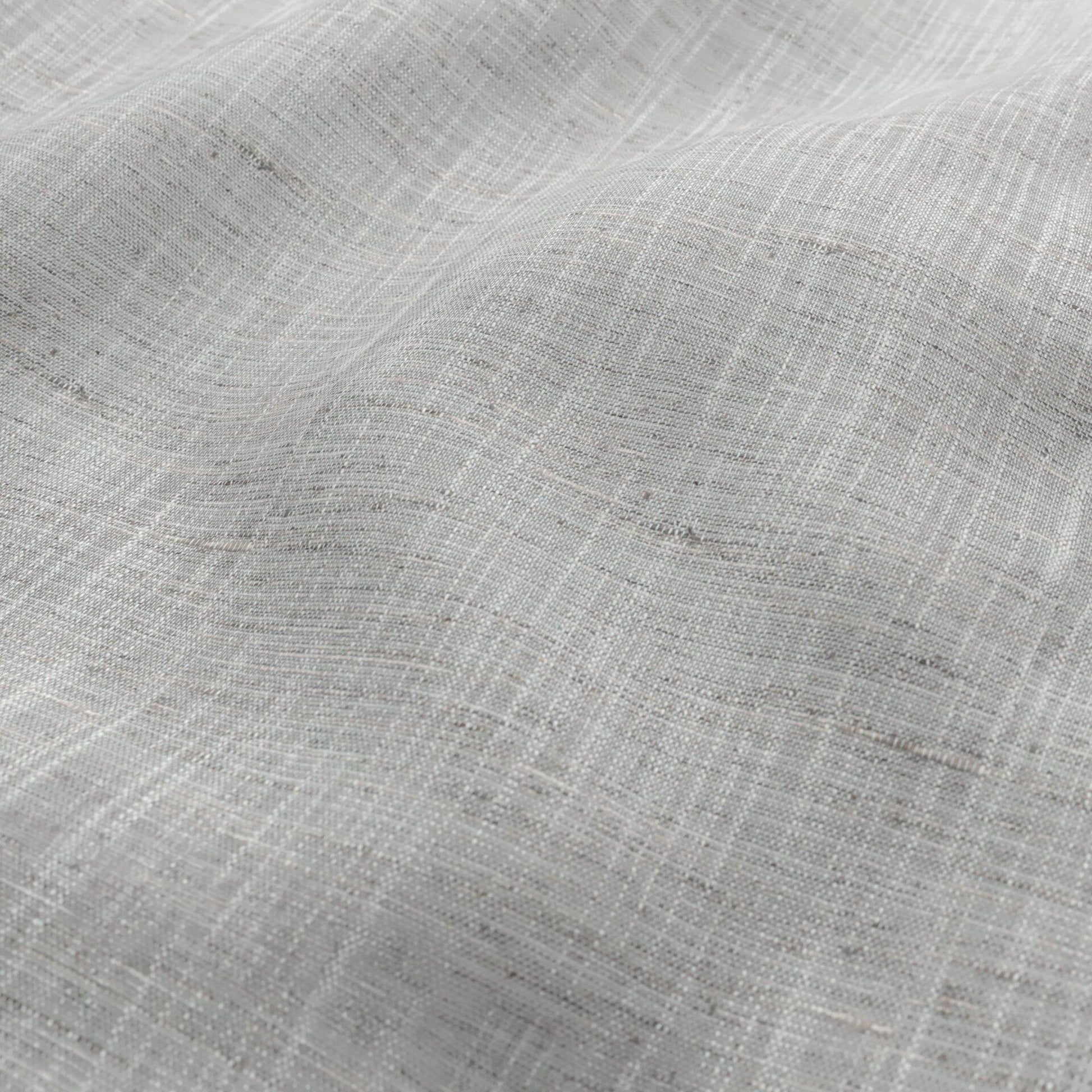 Light gray linen fabric with a subtle grid weave and soft drape, showcasing a natural, airy texture.