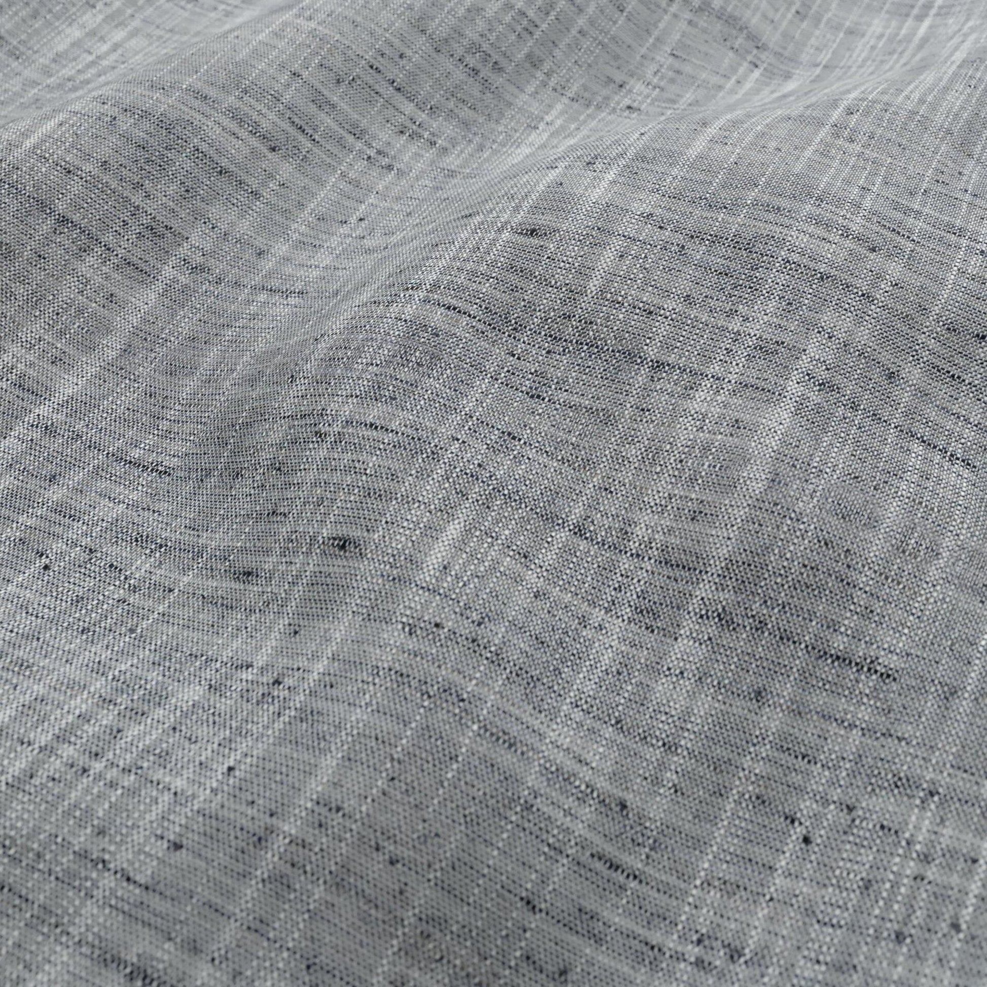 Close-up of light gray linen-like fabric with a woven crosshatch pattern and soft drape.