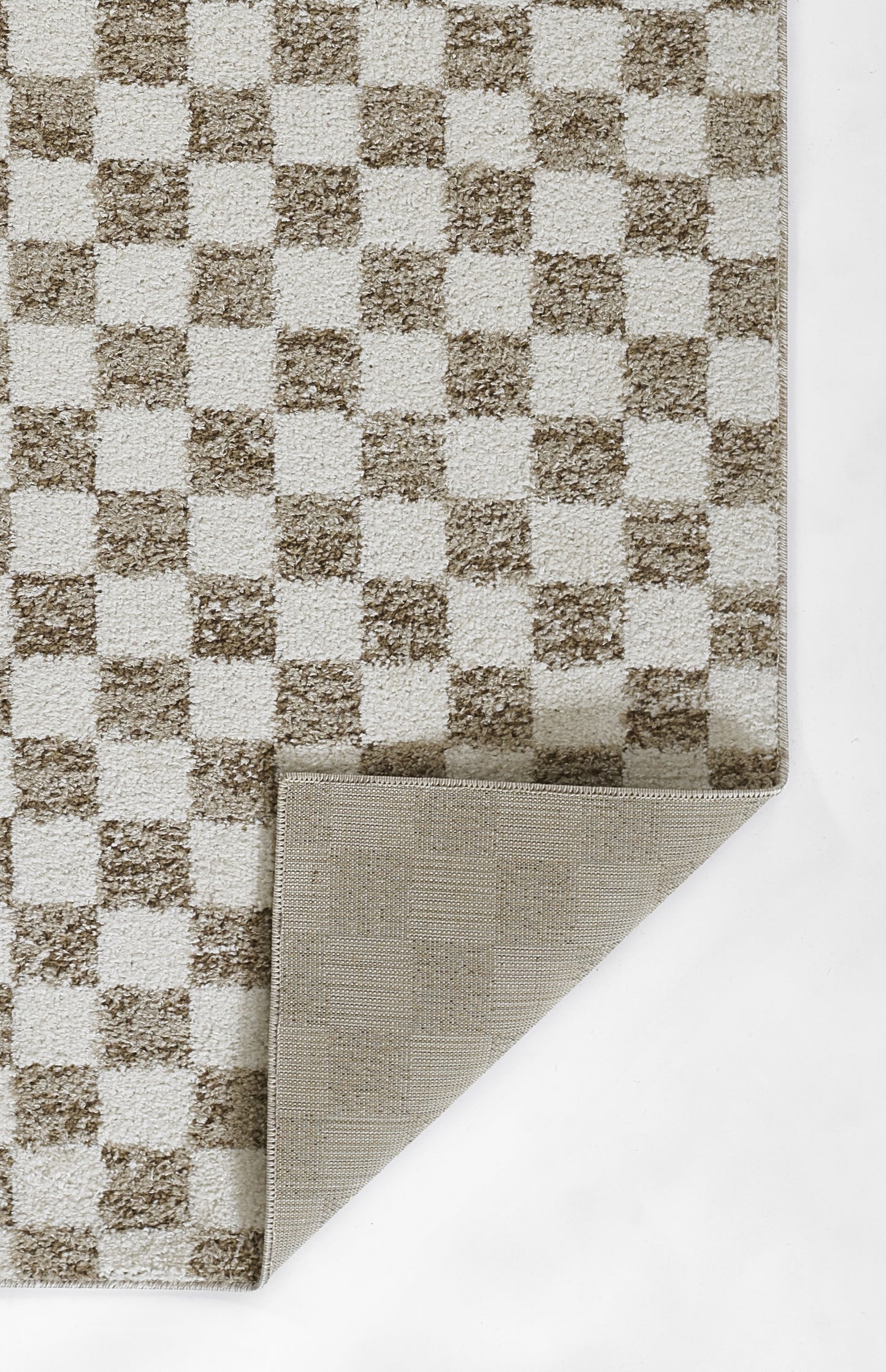 Brown and cream checkered rug with woven texture; folded corner shows beige backing.