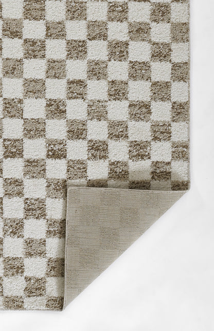 Brown and cream checkered rug with woven texture; folded corner shows beige backing.