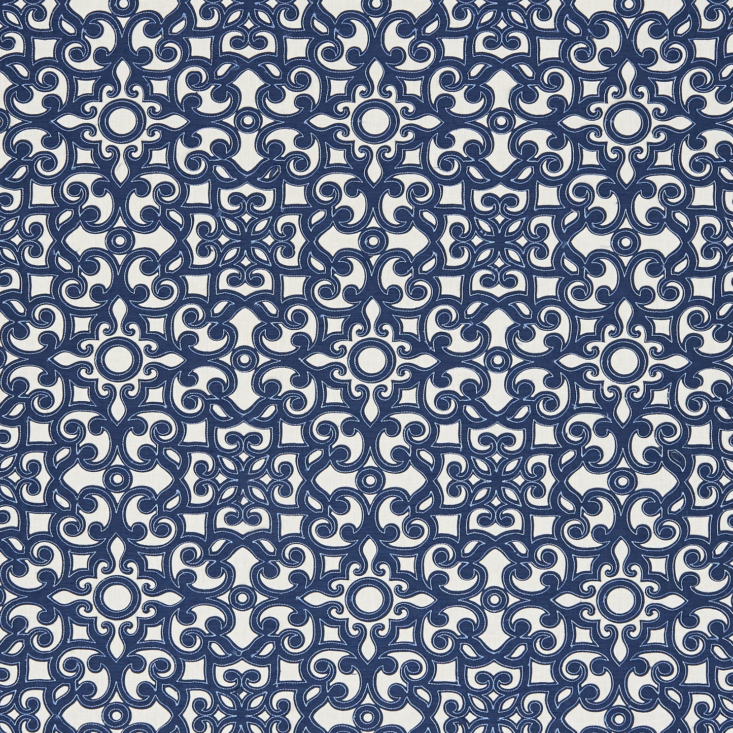 Navy blue and ivory damask tile pattern with circular medallions; ornate print for wallpaper or upholstery.