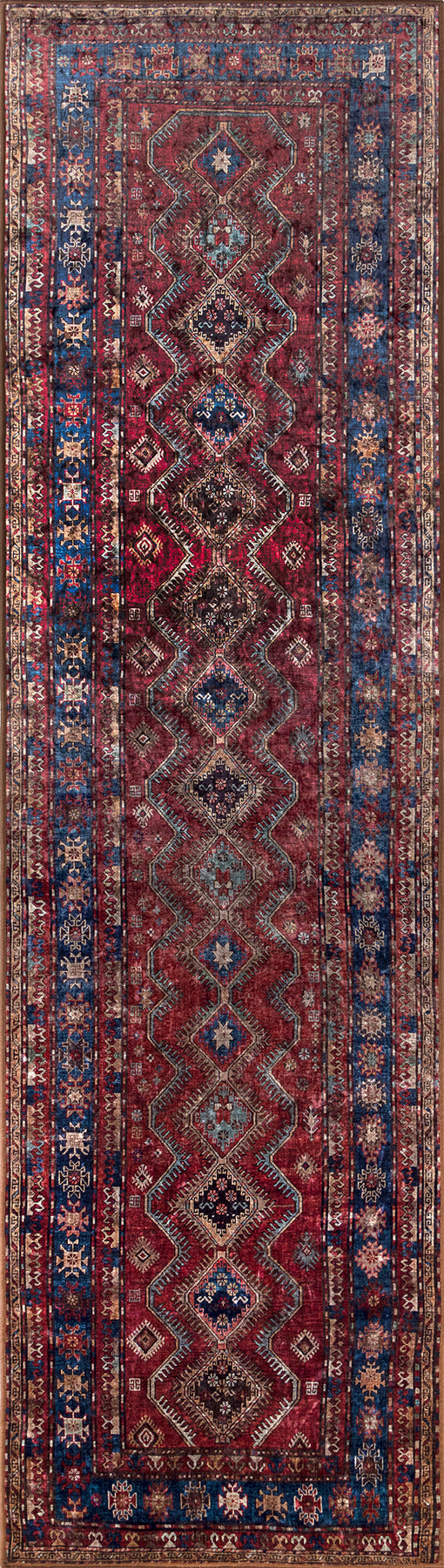 8' x 10' Persian-style rug with a red central field of diamond medallions, blue borders, and ivory accents.