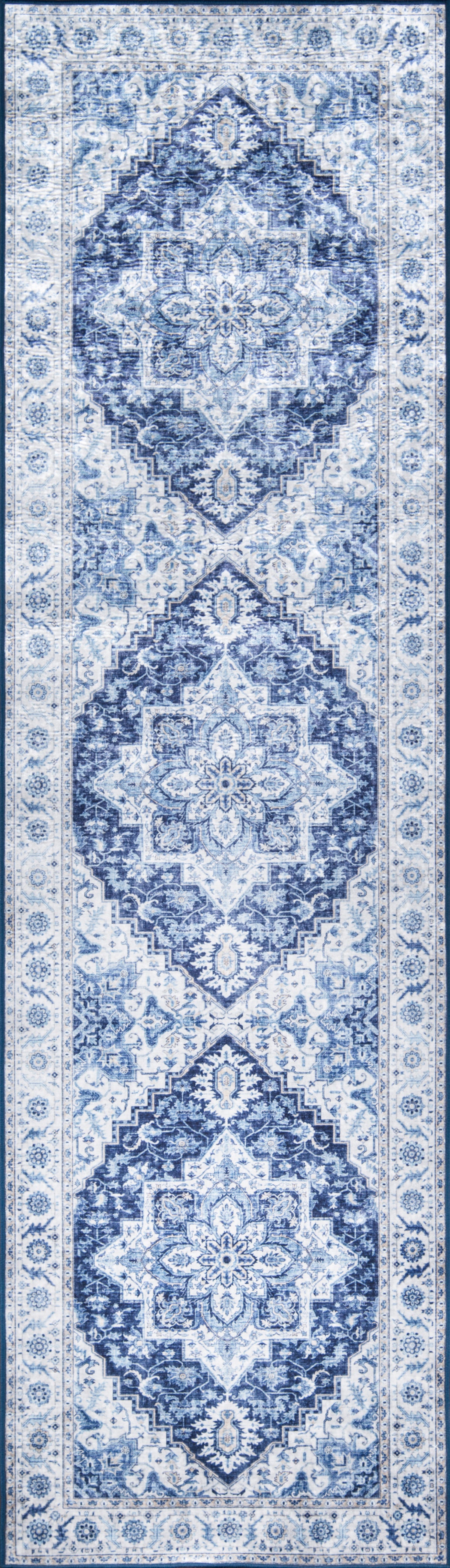Blue and white woven runner rug with ornate Persian-style medallions and borders for hallway decor.