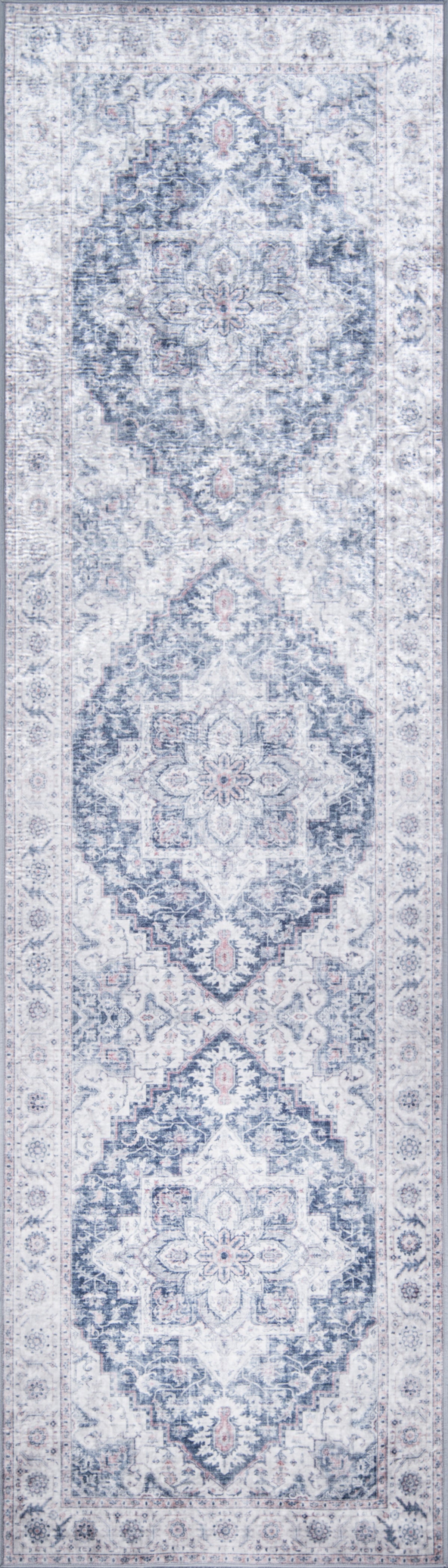Gray-blue Persian-style rug with ivory repeating medallions and ornate borders.