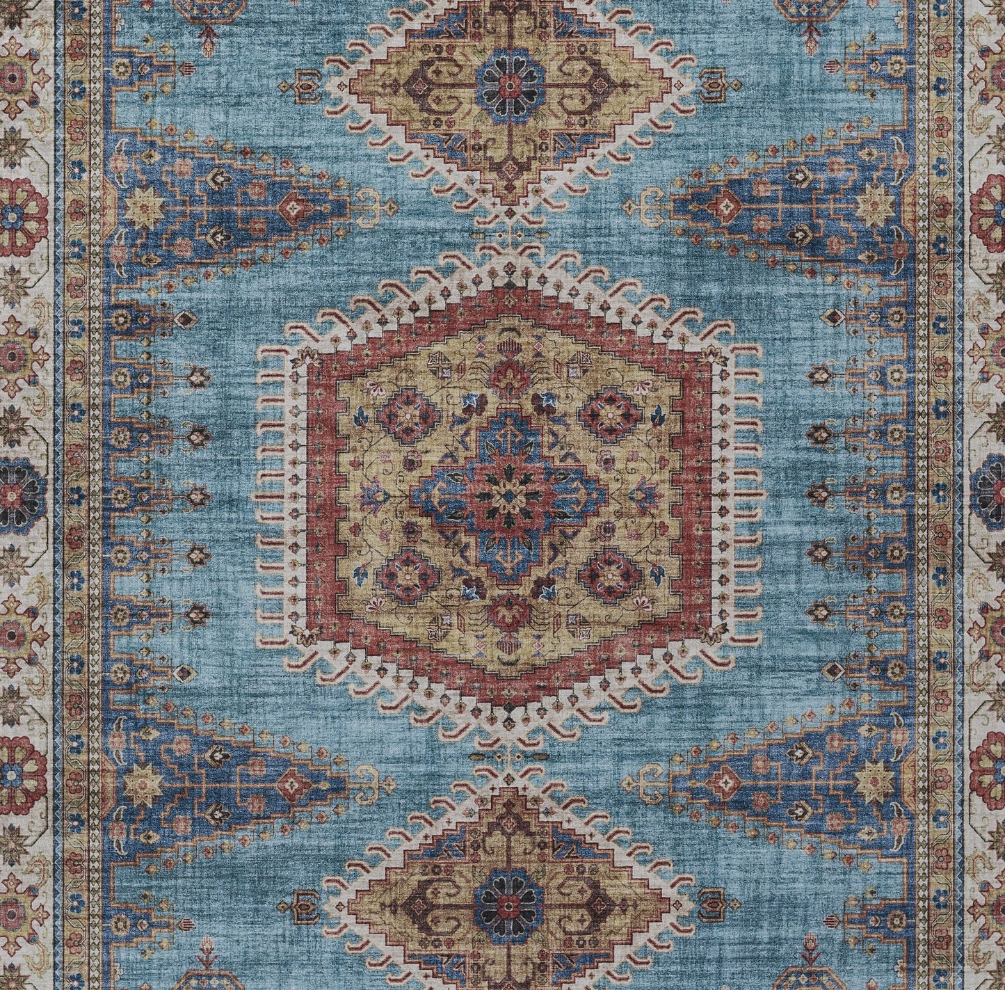 Blue Persian-style rectangular rug with ivory hexagonal central medallion, red border, ornate floral motifs.