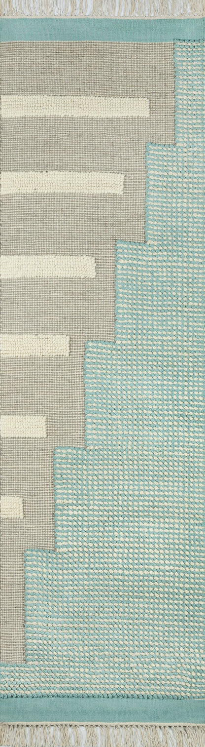 Woven area rug with beige field, white rectangular stripes, blue stepped edge and turquoise border; modern geometric.