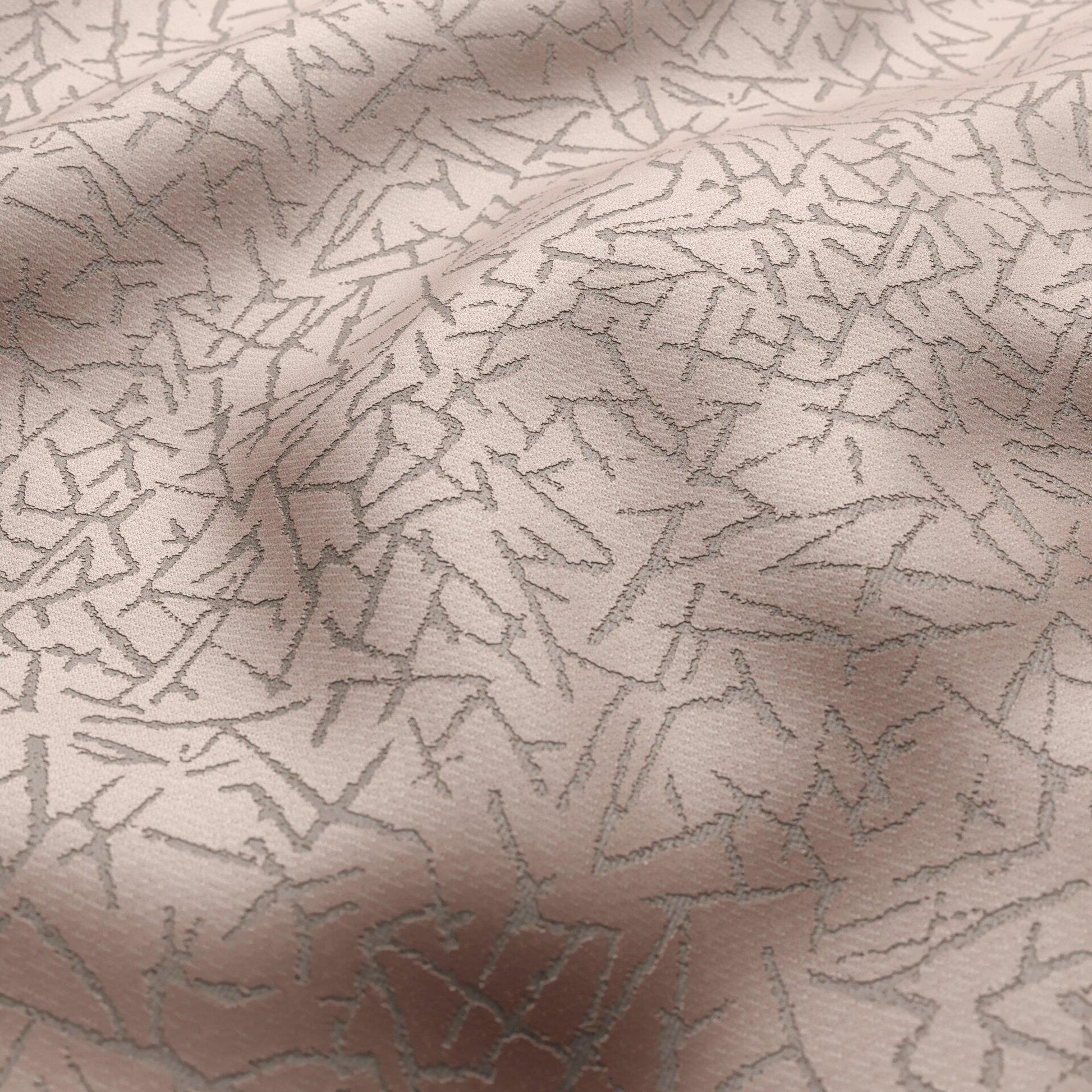 Blush pink velvet fabric with abstract silver shard pattern; textured.