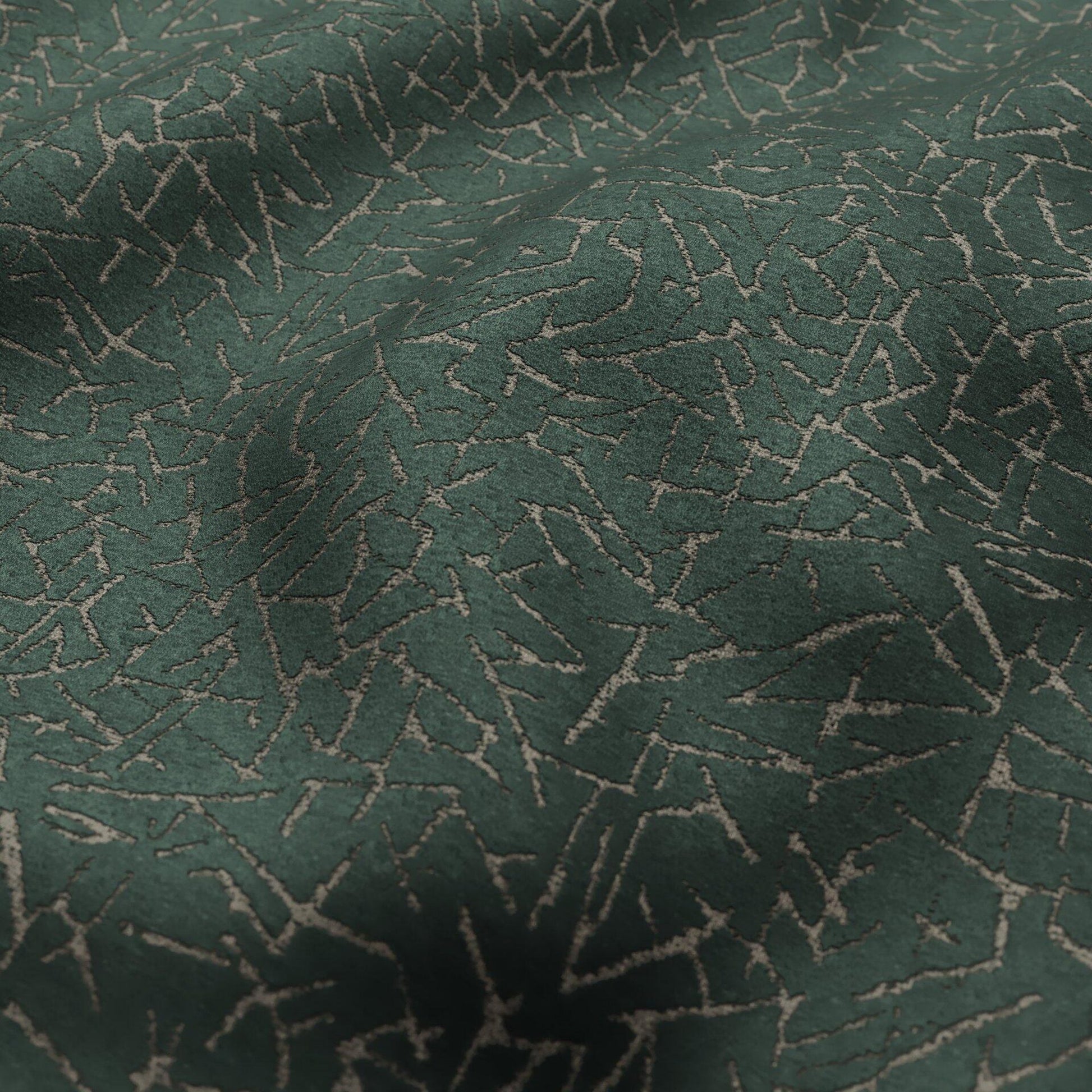 Teal velvet fabric with an abstract crackle pattern; textured upholstery fabric suitable for sofas or curtains.