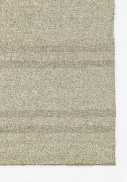 Beige textured rug with plush pile and subtle horizontal stripe bands in neutral tones.