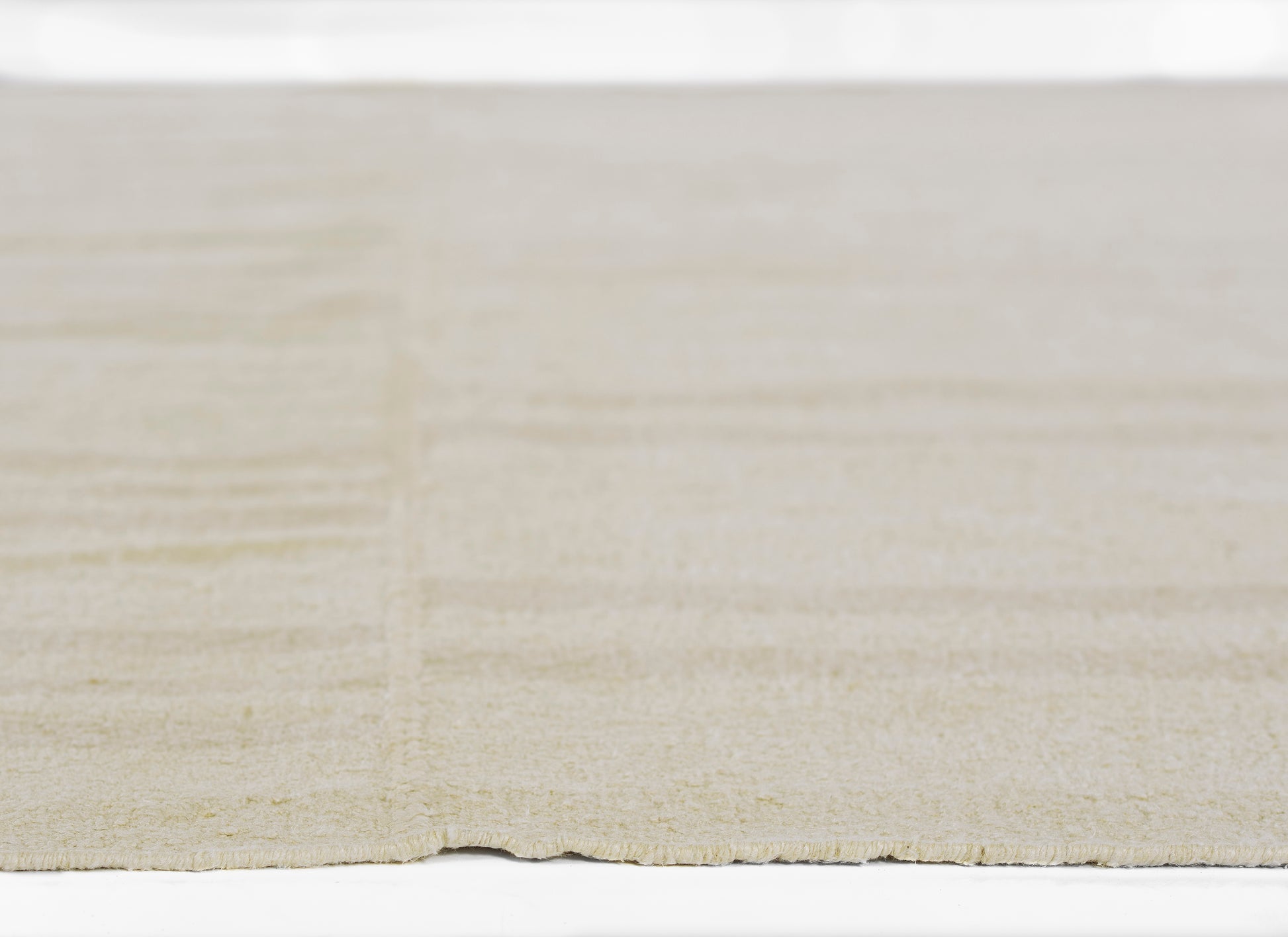 Beige striped runner rug with subtle tonal shading and a slightly irregular edge, 2'6" x 8'.