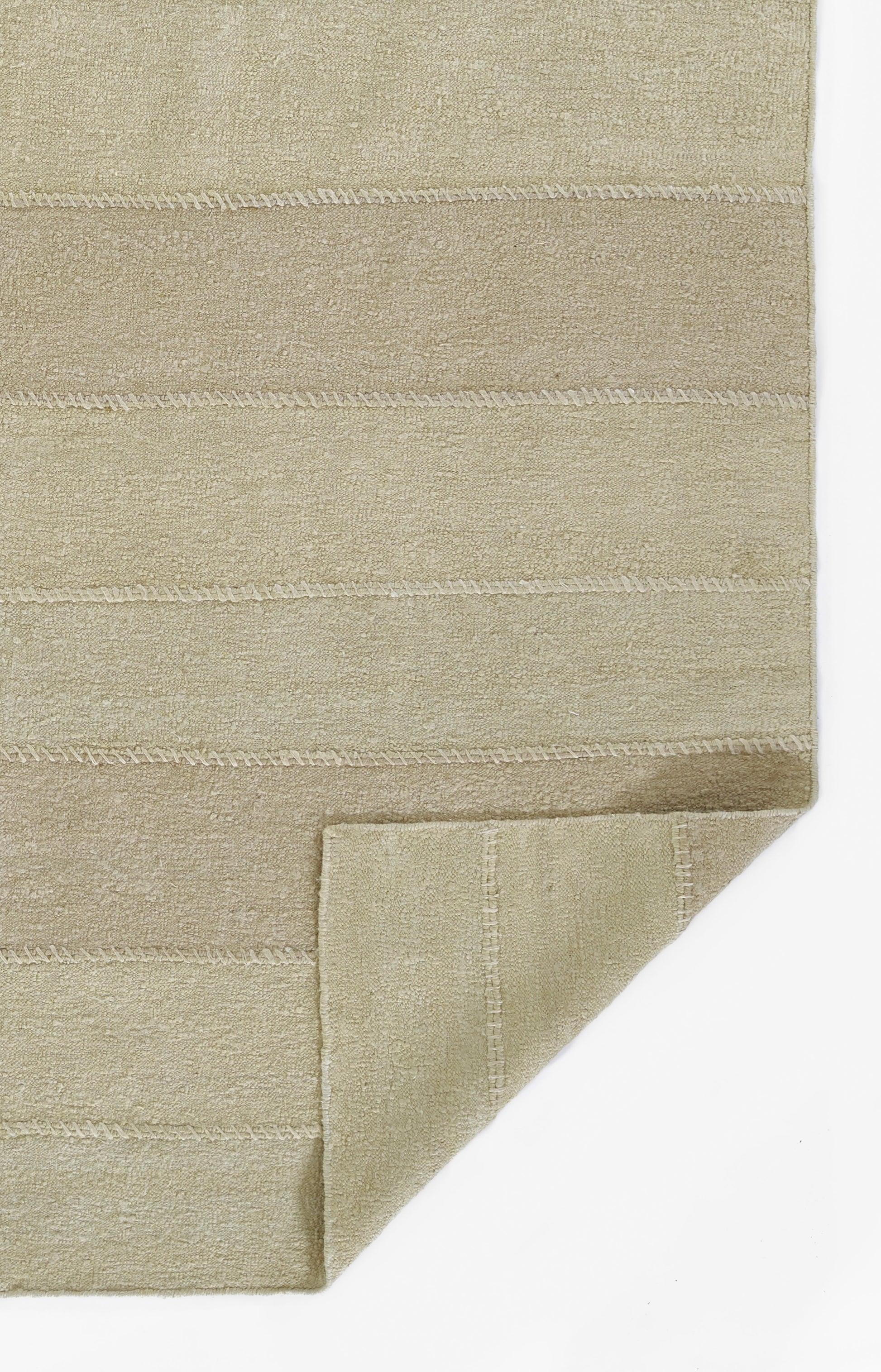 Beige woven runner rug with pale horizontal stripes and soft textured pile; folded corner detail; 2'6" x 8'.