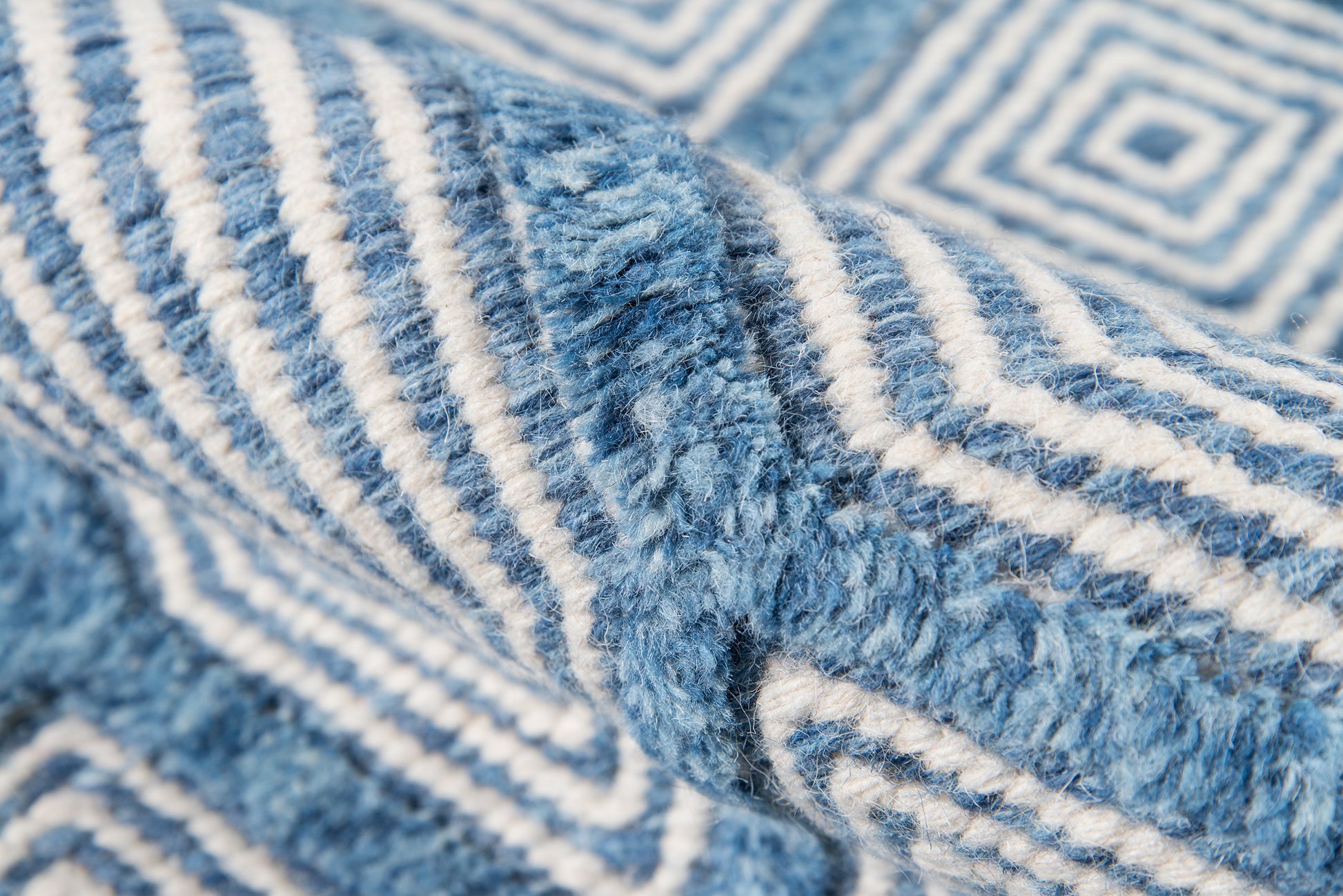 Blue and white striped plush rug with soft pile; 4' x 6'.