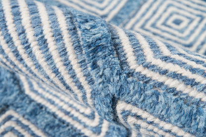 Blue and white striped plush rug with soft pile; 4' x 6'.