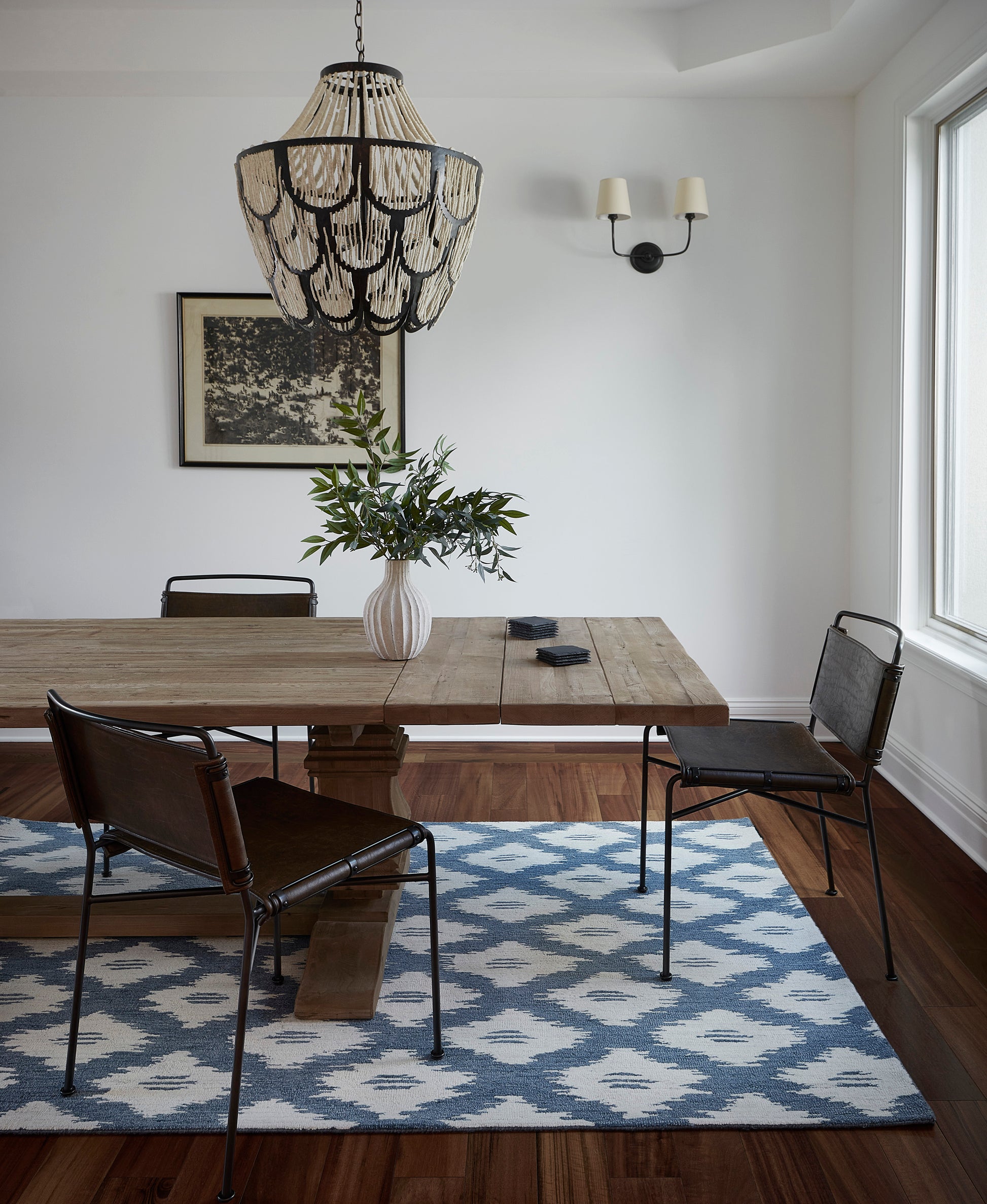 Blue patterned rug, 5' x 8'.
