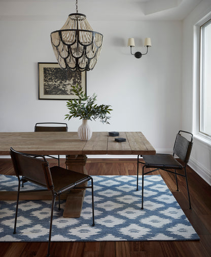 Blue patterned rug, 5' x 8'.
