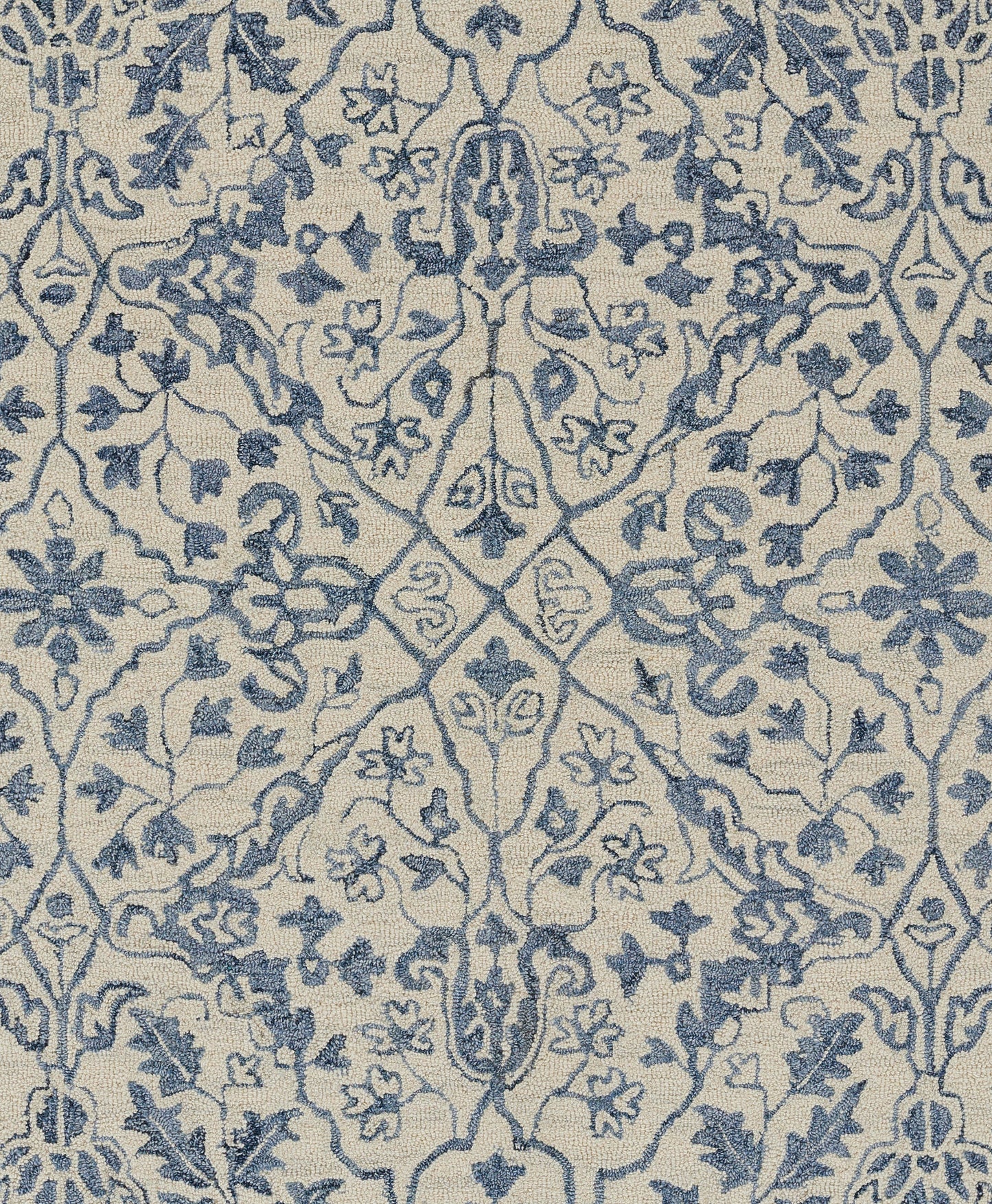 Blue damask pattern on cream background runner rug; ornate floral motifs, woven textile.