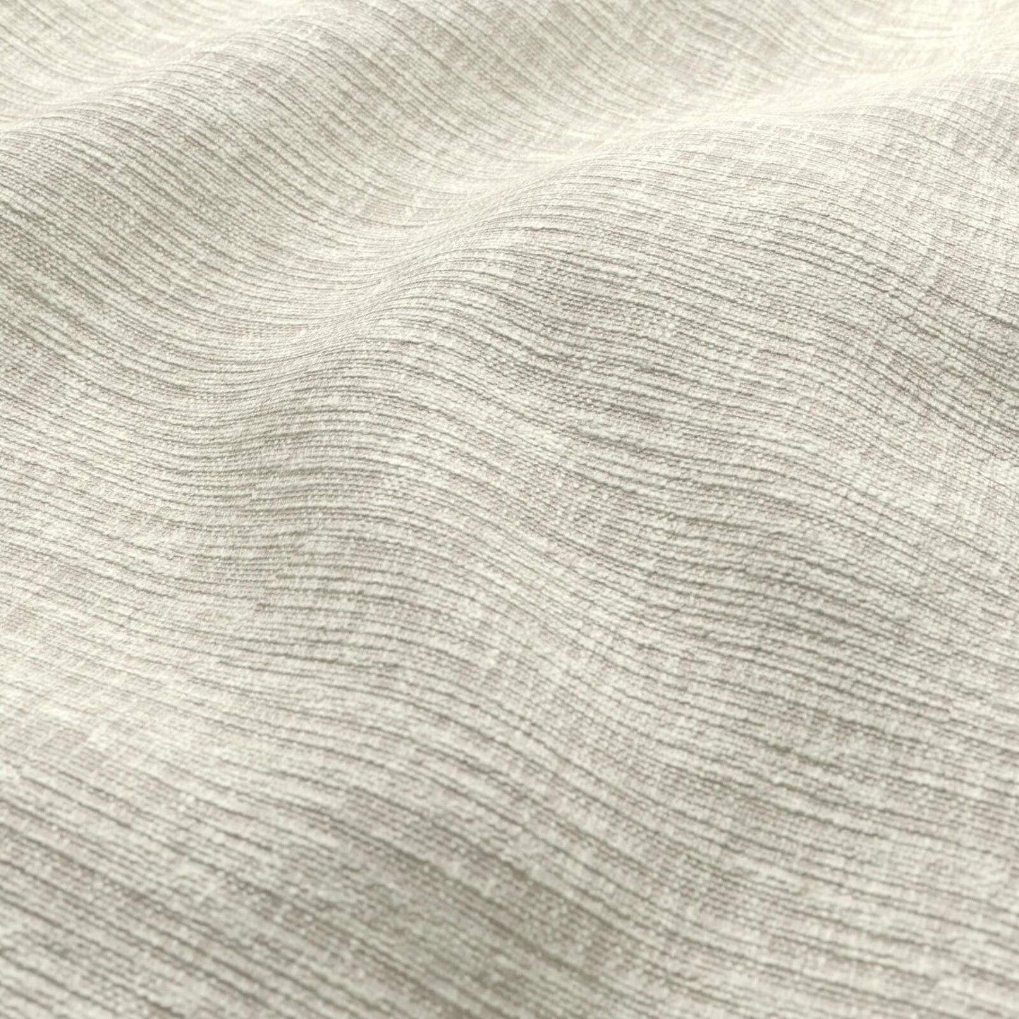 Beige textured fabric with subtle horizontal waves and a linen-like weave.