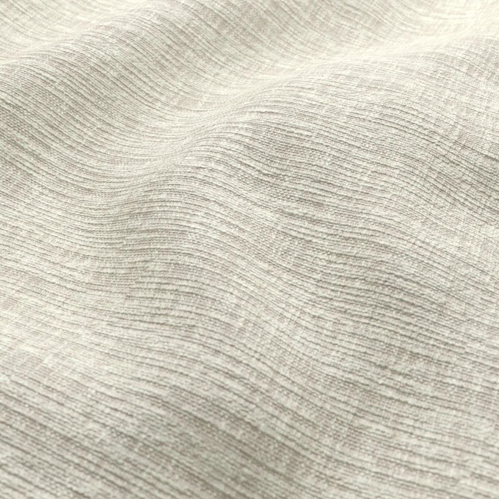 Beige textured fabric with subtle horizontal waves and a linen-like weave.
