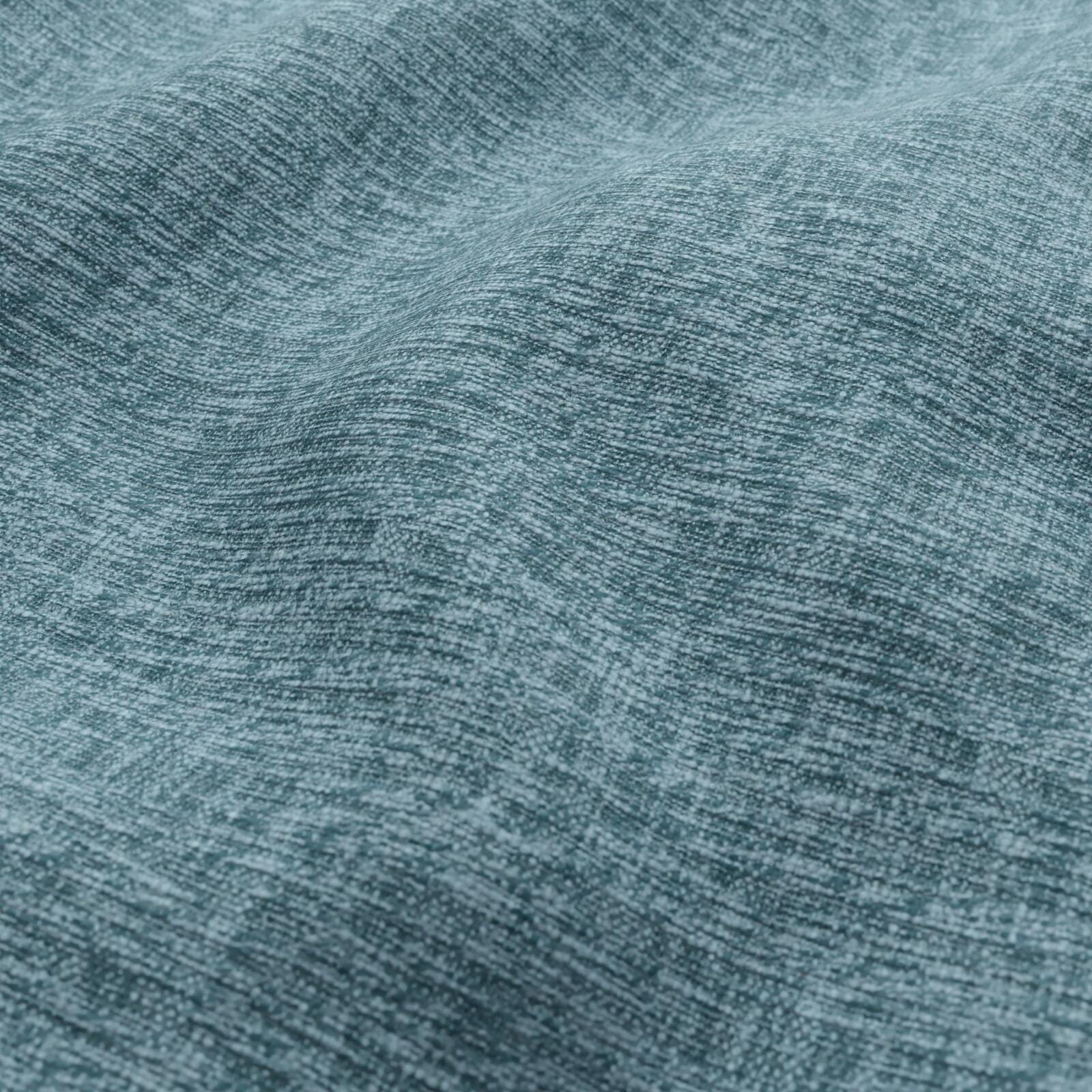 Close-up of blue aqua plain-woven fabric with a smooth, even texture.