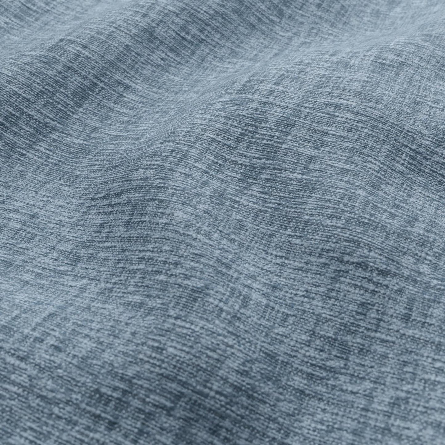 Close-up of blue plain-woven fabric.