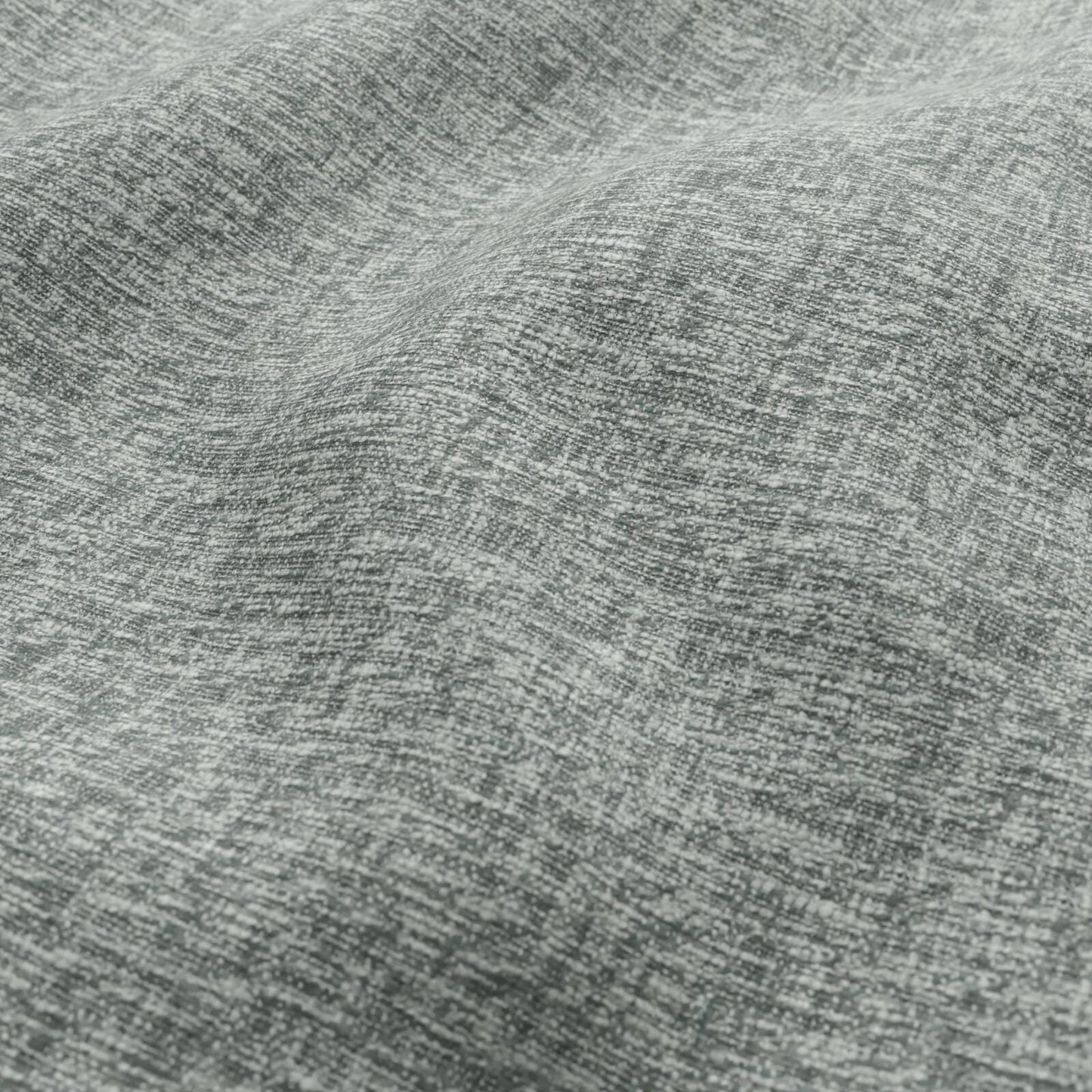 Close-up of a textured woven fabric in pewter & green tones; plain weave with subtle texture.