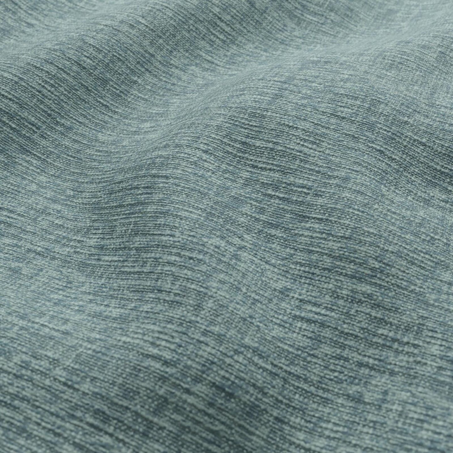 Teal woven plain fabric close-up with subtle texture.