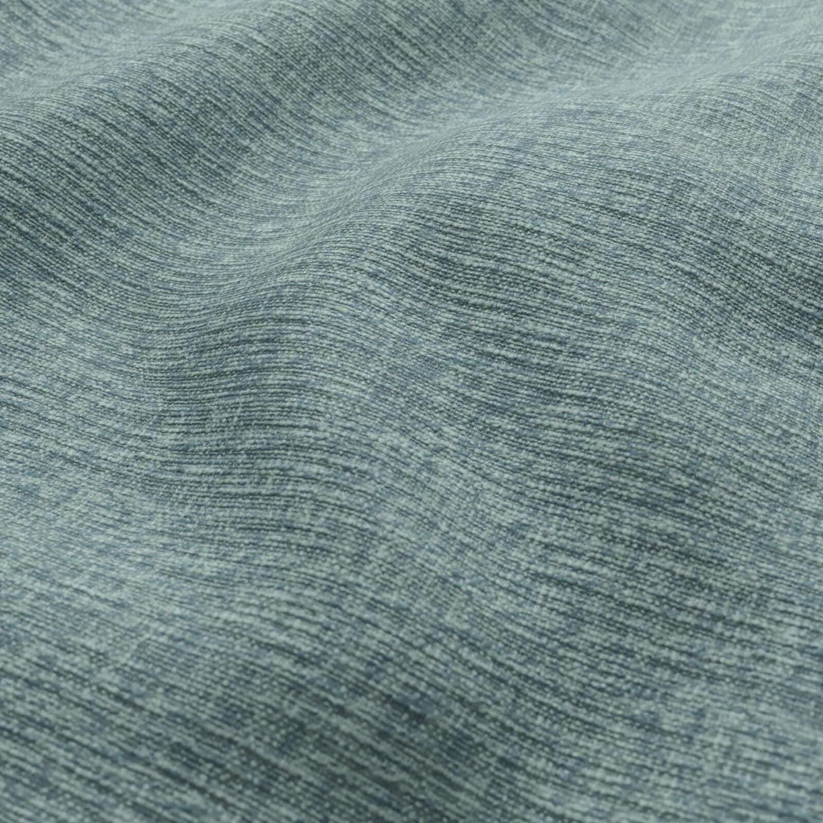 Teal woven plain fabric close-up with subtle texture.