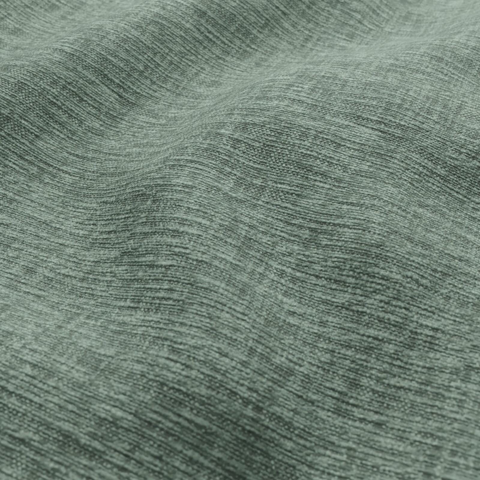 Close-up of sage-green woven fabric with a plain texture.
