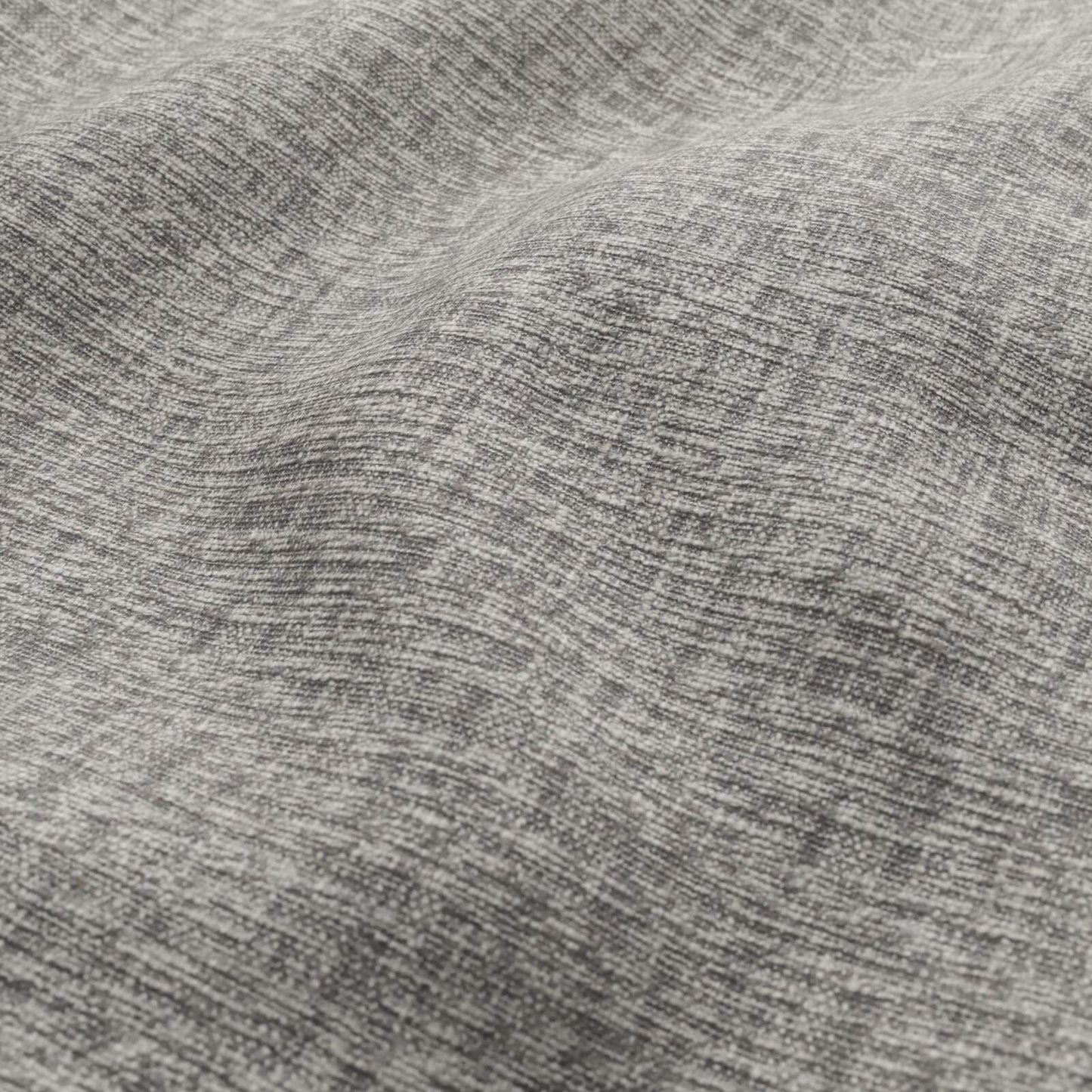 Close-up of plain woven fabric in heather brown and grey with soft texture & subtle marled weave.