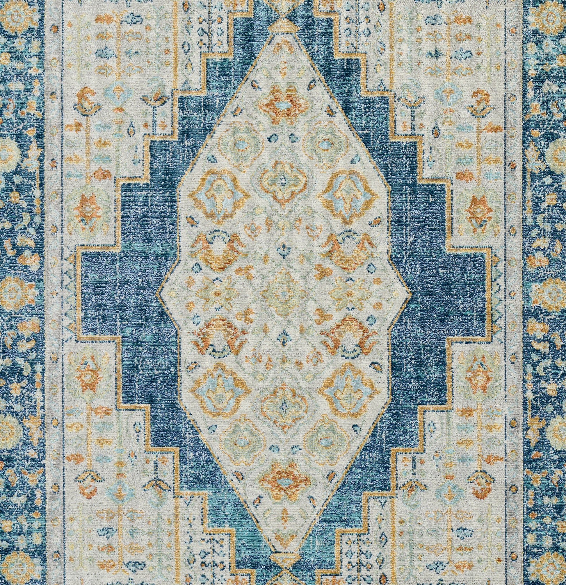 Blue and ivory oriental area rug with central diamond medallion, floral motifs, and stepped border.