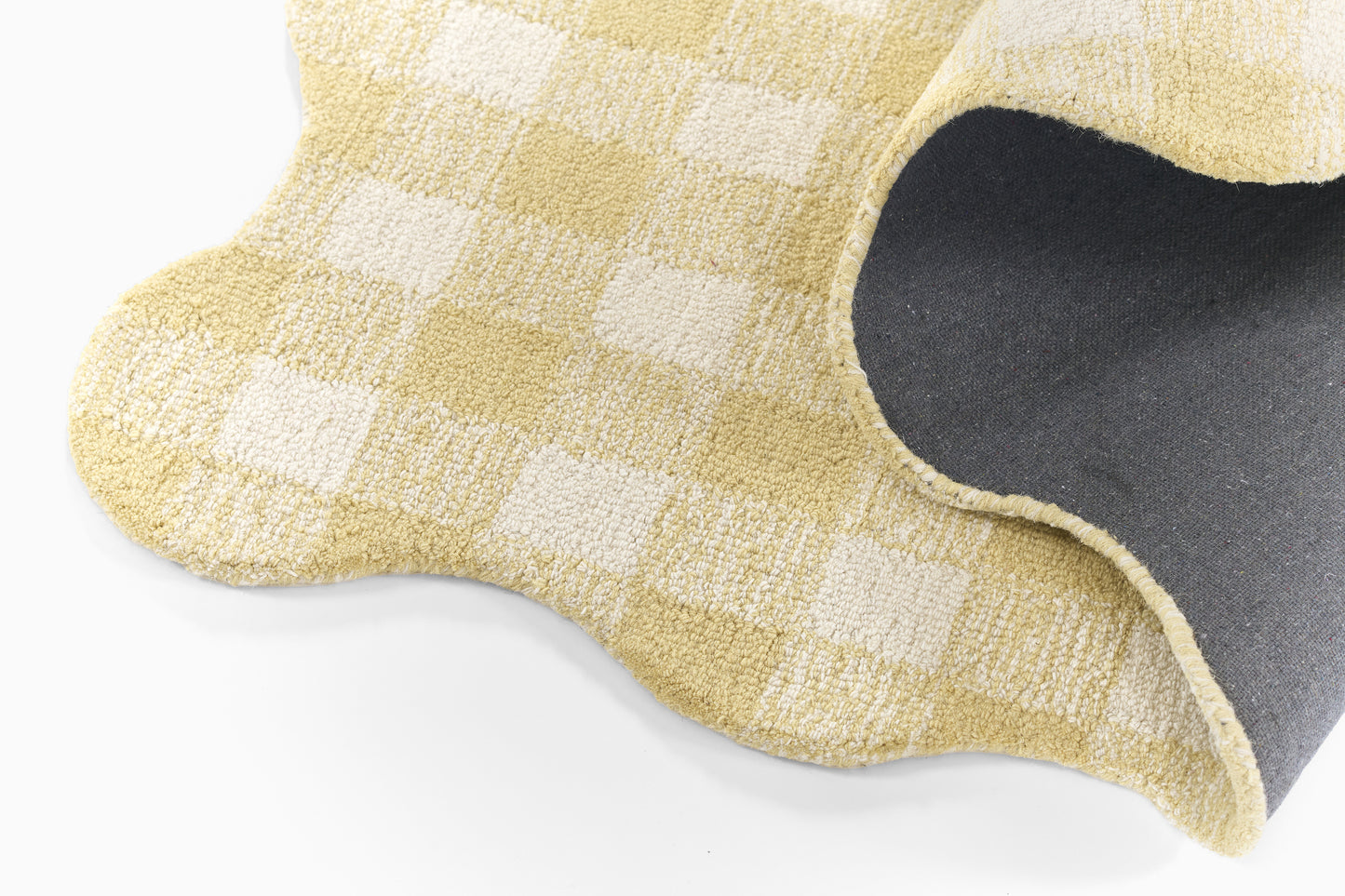 Yellow checkered rug with gray backing, soft and plush, 8' x 10'.
