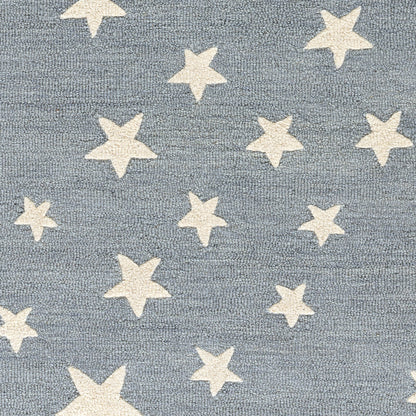 Blue textured fabric with scattered white five-point stars, starry pattern.