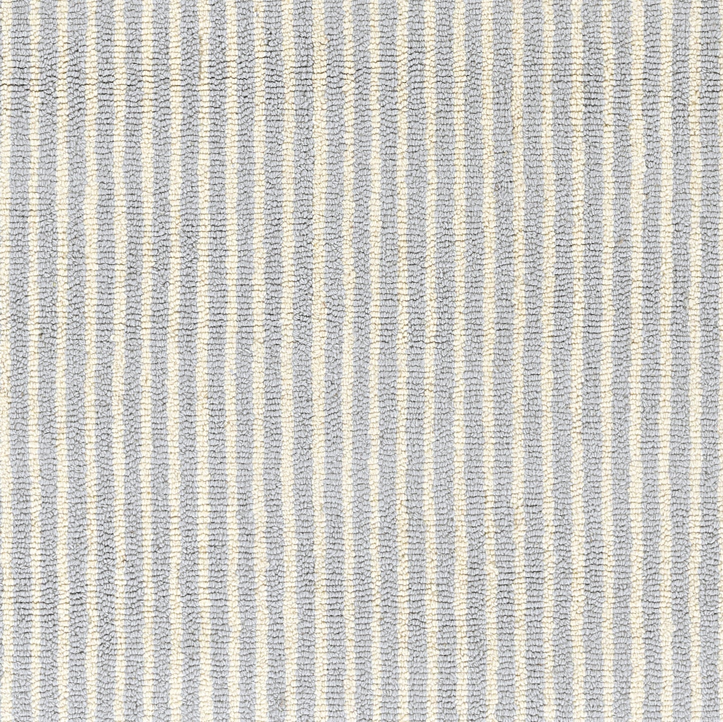 Blue and cream vertical striped woven rug with a textured surface.