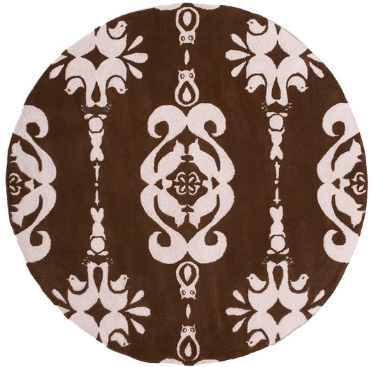 Round rug with dark brown background and cream damask pattern, ornate vintage style.