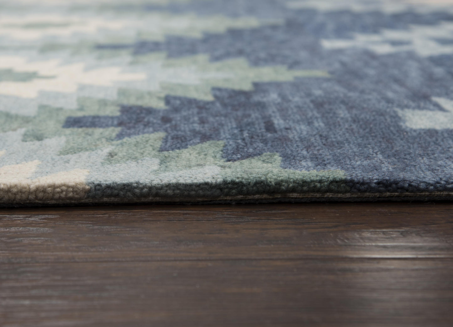 Area rug in rustic lodge style, 5' x 8'.