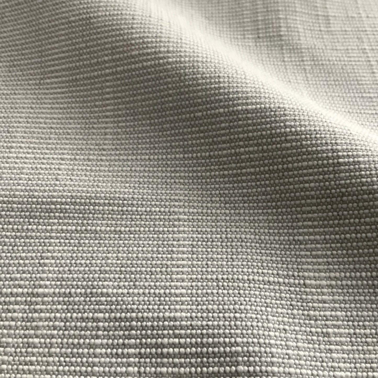 Light gray linen-textured woven fabric with subtle grid weave and soft drape, ideal for lounger upholstery.
