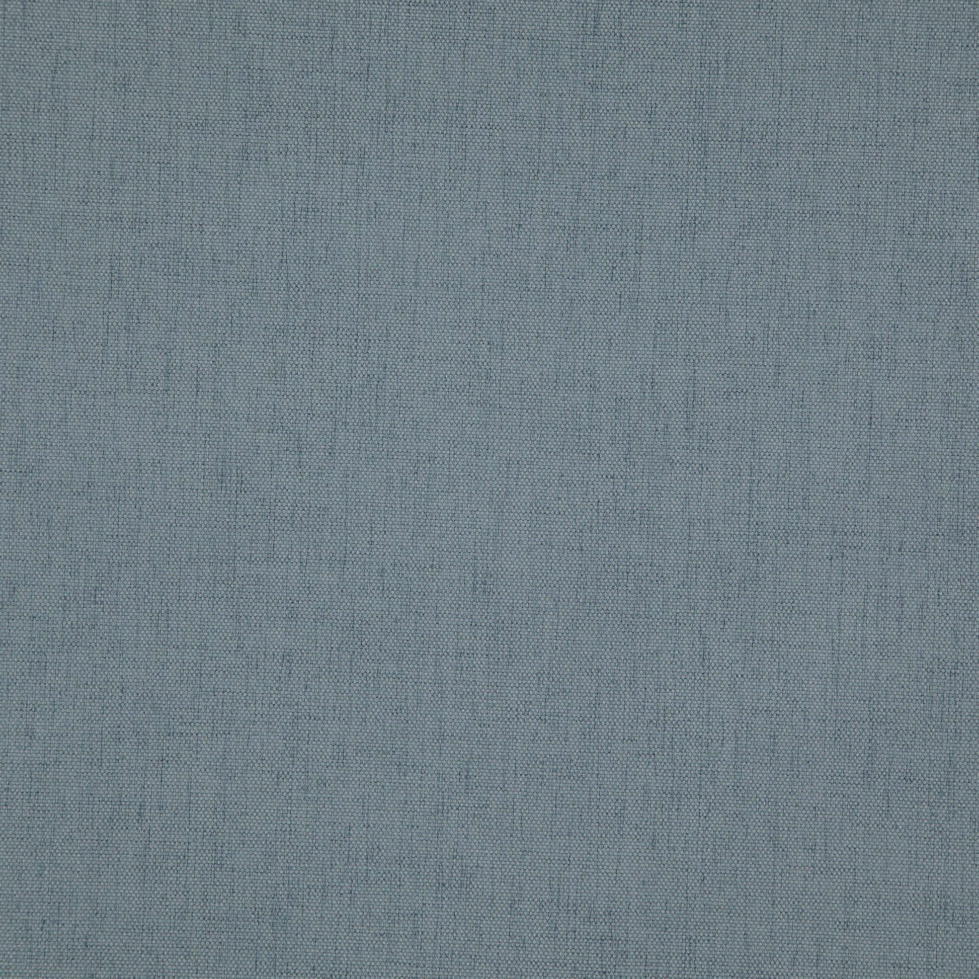 Blue linen-textured fabric close-up with subtle grain and soft texture.