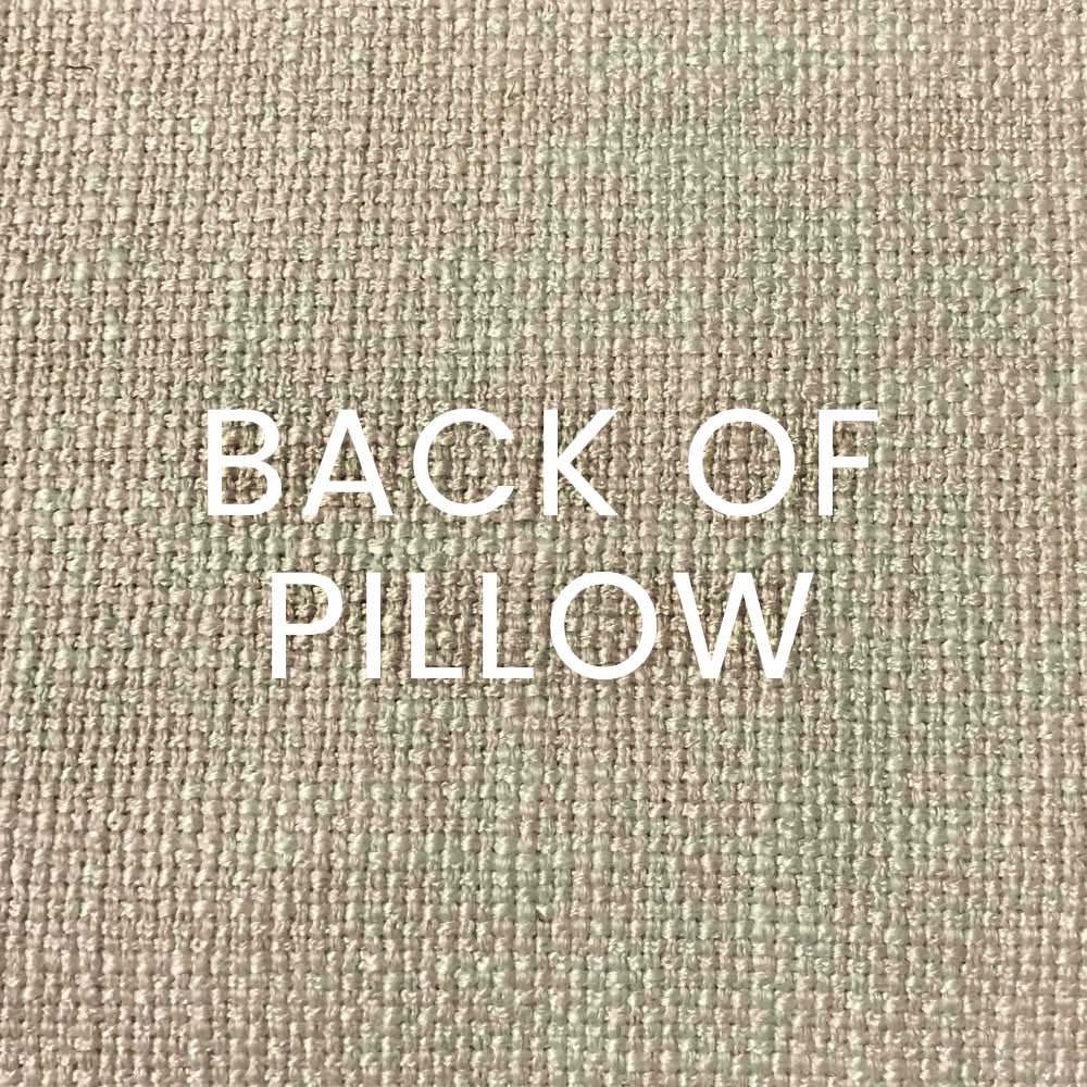 Close-up of coral pillow back in woven fabric with white BACK OF PILLOW text, 24" x 24".