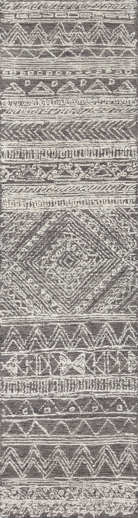 Grey & white woven rug with tribal geometric diamonds & chevrons; rectangular boho-style home decor textile.