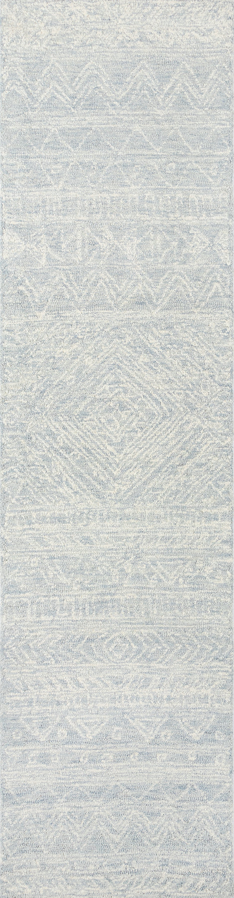 Rectangular light gray rug with white geometric diamond and zigzag motifs; modern tribal style.