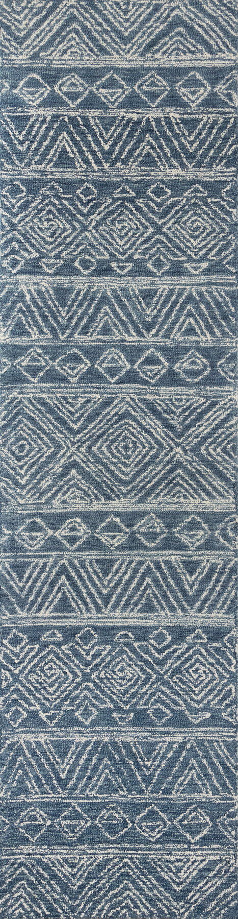 Blue and white woven textile with repeating diamonds and chevrons; tribal-style rug or throw.