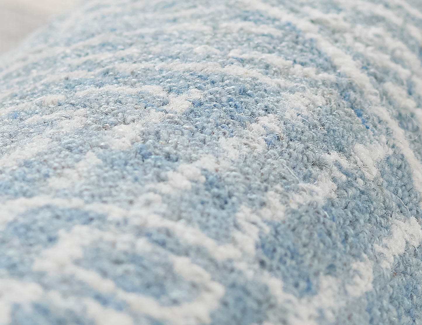 Blue and white plush shag rug with soft, textured pile.